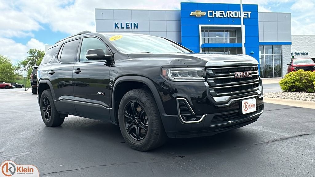 2022 GMC Acadia AT4 in Ebony Twilight Metallic — front three-quarter view