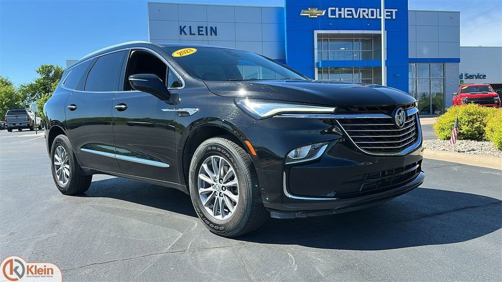 2023 Buick Enclave Essence in Ebony Twilight Metallic — front three-quarter view