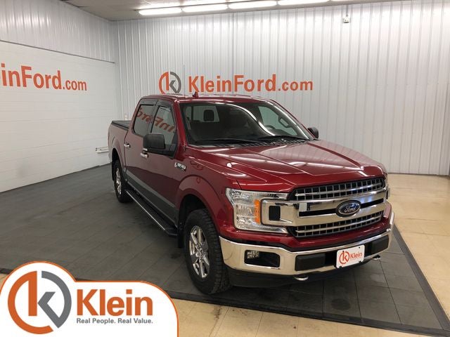 2018 Ford F-150 XLT 302A in Ruby Red Metallic Tinted Clearcoat — front three-quarter view