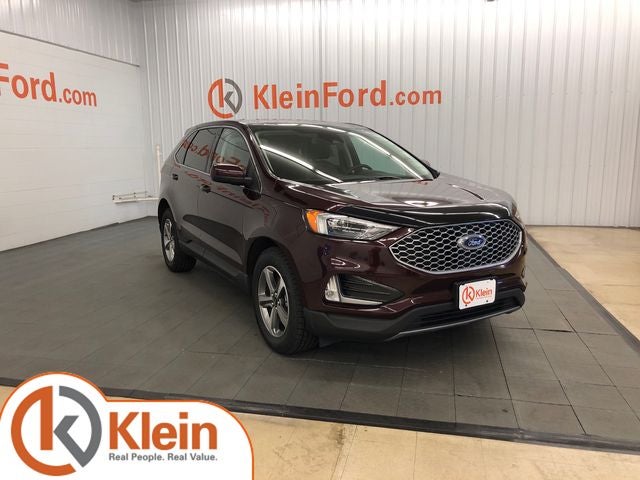2024 Ford Edge SEL ROOF/TOW PACKAGE in Burgundy Velvet Metallic Tinted Clearcoat — front three-quarter view