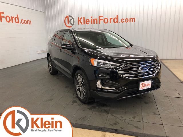 2024 Ford Edge Titanium 301A in Agate Black Metallic — front three-quarter view